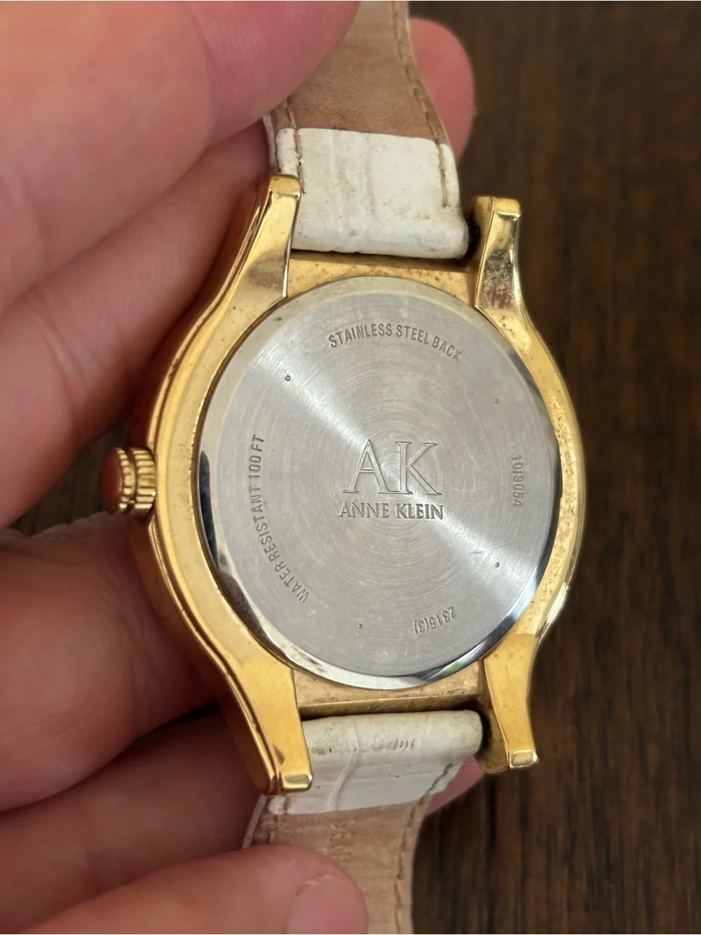 Anne Klein Gold and White Leather Strap Crystal Accent Watch